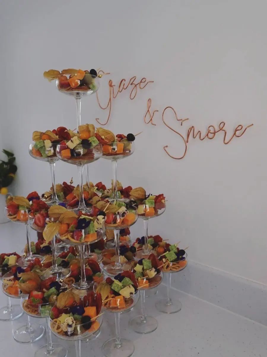 Graze and S'more afternoon tea grazing board with brownies and sausage rolls for a wedding at Millbrook Estate
